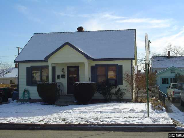 418-420 Wonder Street Reno, NV 89502 - Photo 1 of 2 a front view of a house with garden
