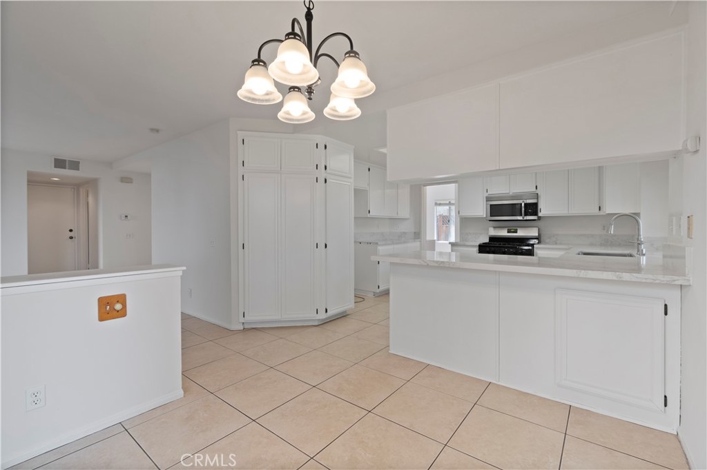 14 La Ramada Place Phillips Ranch, CA 91766 - Photo 28 of 61 Casual Dining area toward Kitchen an Den