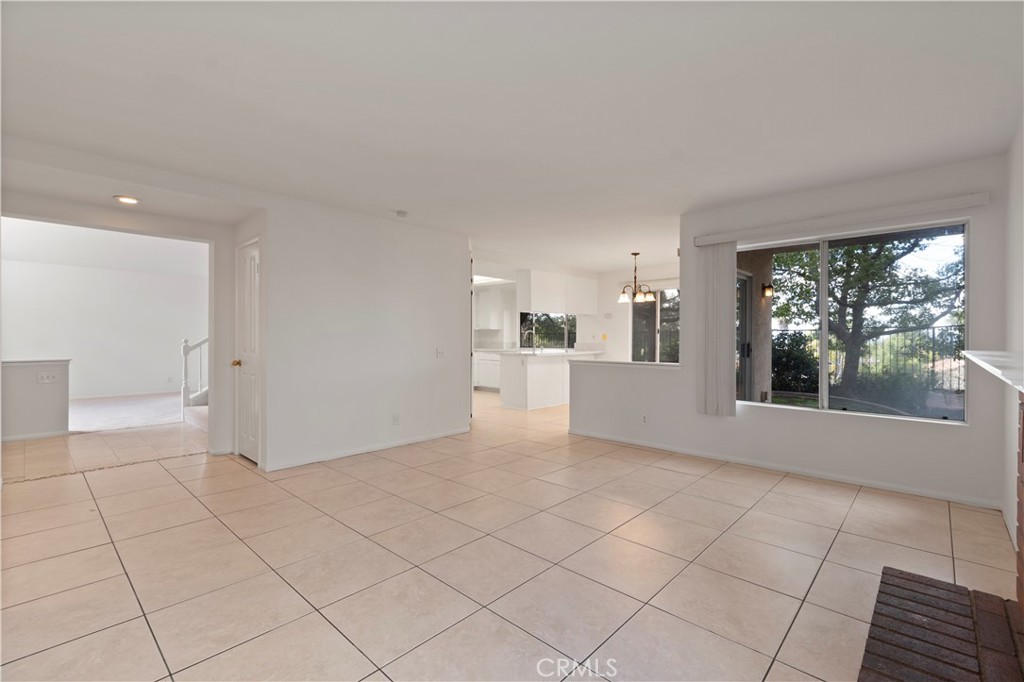 14 La Ramada Place Phillips Ranch, CA 91766 - Photo 31 of 61 a view of a big room with windows and kitchen view