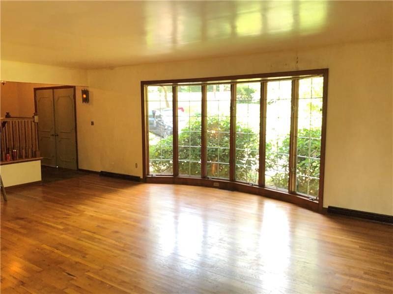 159 Hilton Road Greensburg, PA 15601 - Photo 3 of 22 Hardwood Floors - Huge Window to offer plenty of sunlight.