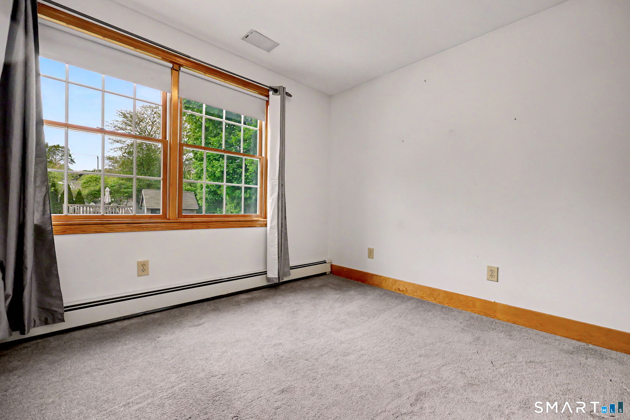 7 Merrill Road Trumbull, CT 06611 - Photo 34 of 40 a view of an empty room with a window