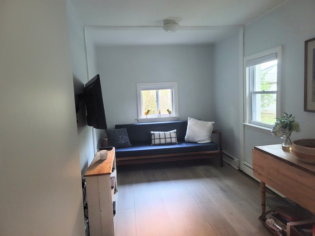 24 Pattison Avenue Dudley, MA 01571 - Photo 5 of 9 a view of a workspace with furniture and a window