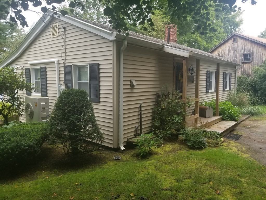 24 Pattison Avenue Dudley, MA 01571 - Photo 9 of 9 a view of a house with a yard