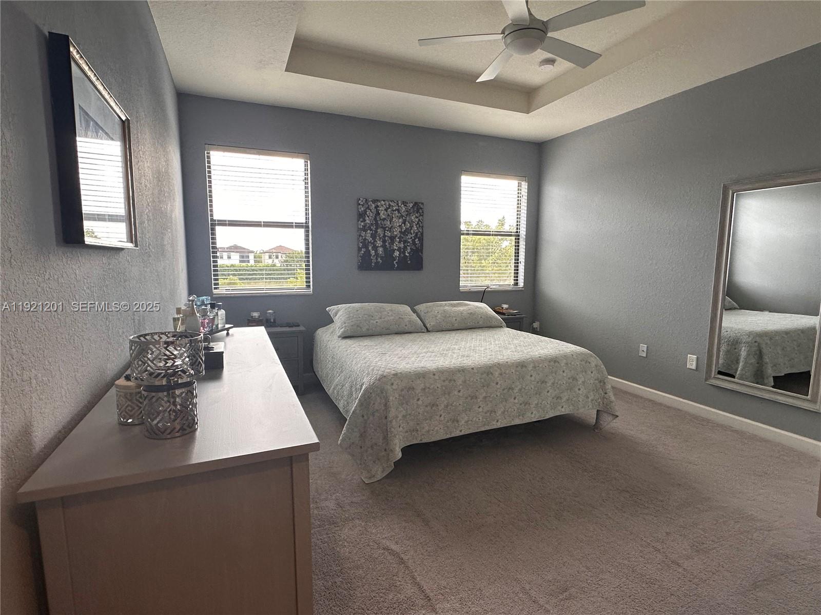 3378 West 100th Terrace, Unit 3378 Hialeah, FL 33018 - Photo 20 of 41 a bedroom with a bed and window