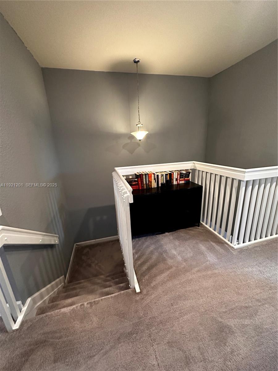 3378 West 100th Terrace, Unit 3378 Hialeah, FL 33018 - Photo 40 of 41 a view of an empty room