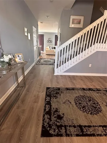 a view of a living room and dining room