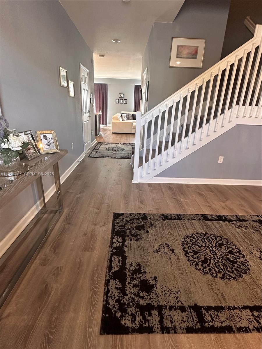 3378 West 100th Terrace, Unit 3378 Hialeah, FL 33018 - Photo 7 of 41 a view of a living room and dining room