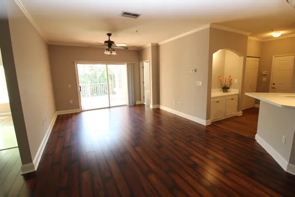 a kitchen with stainless steel appliances a sink a stove and refrigerator