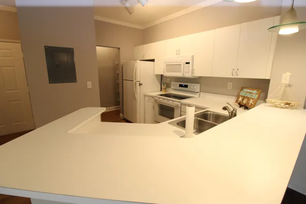 a bathroom with a sink and a large mirror