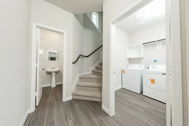 a view of entryway with wooden floor