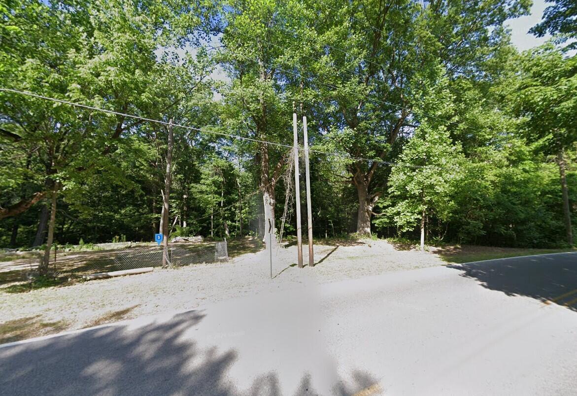 3625 Old Paris Road West Terre Haute, IN 47885 - Photo 2 of 5 a view of a road with a trees