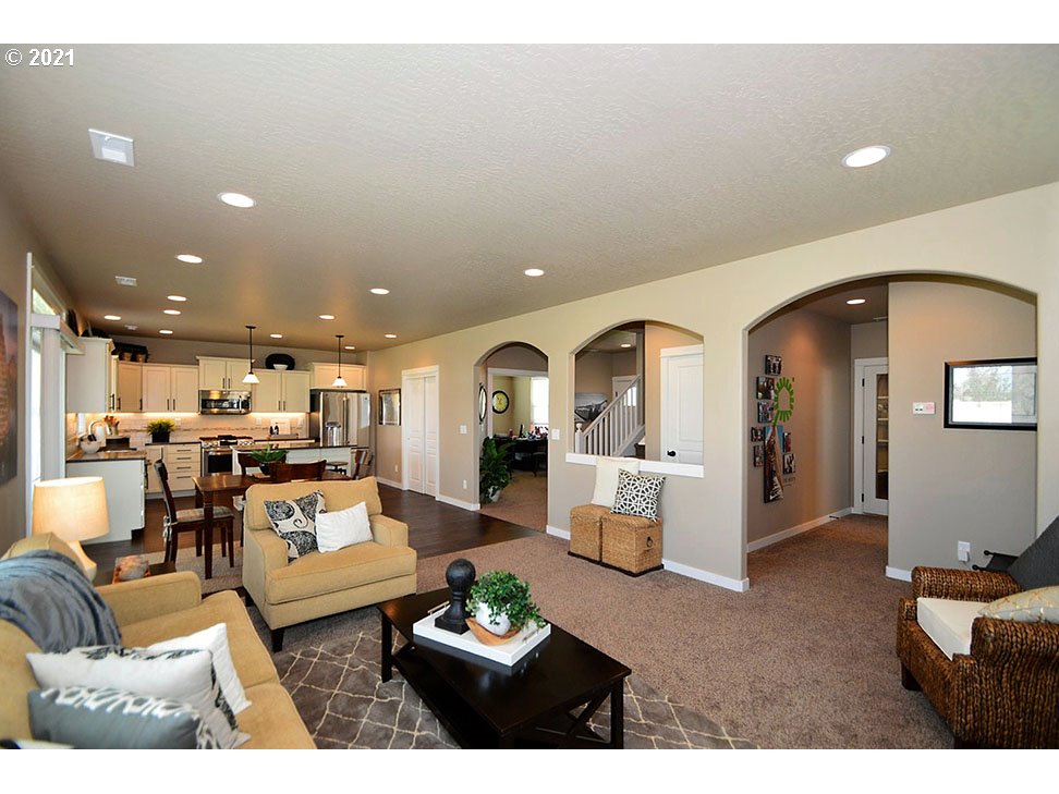 1375 Lorien Lane Eugene, OR 97404 - Photo 3 of 7 a living room with furniture and a wooden floor