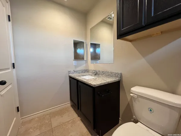 a view of a hallway with closet area
