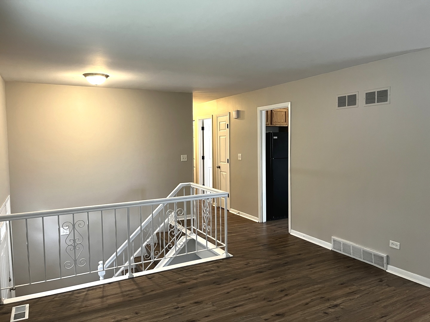 16524 Woodlawn W Avenue South Holland, IL 60473 - Photo 6 of 20 a view of a hallway with wooden floor