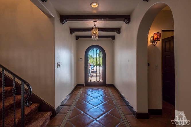 2016 Rayshire Street Thousand Oaks, CA 91362 - Photo 12 of 66 a view of a hallway with entryway wooden floor and front door