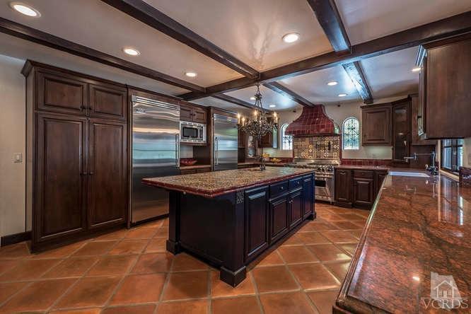 2016 Rayshire Street Thousand Oaks, CA 91362 - Photo 21 of 66 a large kitchen with stainless steel appliances granite countertop a stove and a sink