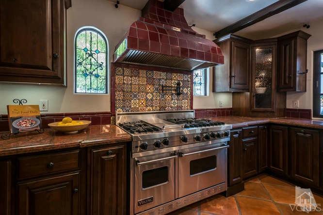 2016 Rayshire Street Thousand Oaks, CA 91362 - Photo 22 of 66 a kitchen with stainless steel appliances granite countertop a stove and a sink