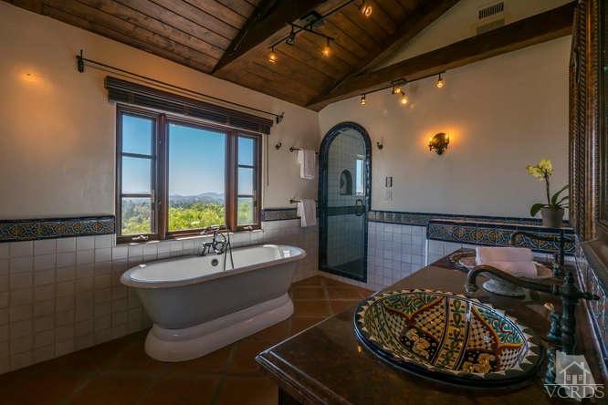 2016 Rayshire Street Thousand Oaks, CA 91362 - Photo 38 of 66 a bathroom with a sink and a mirror
