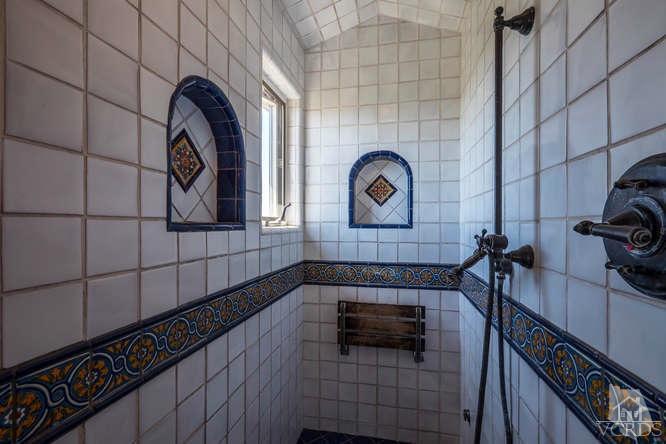 2016 Rayshire Street Thousand Oaks, CA 91362 - Photo 39 of 66 a bathroom with a sink and a mirror
