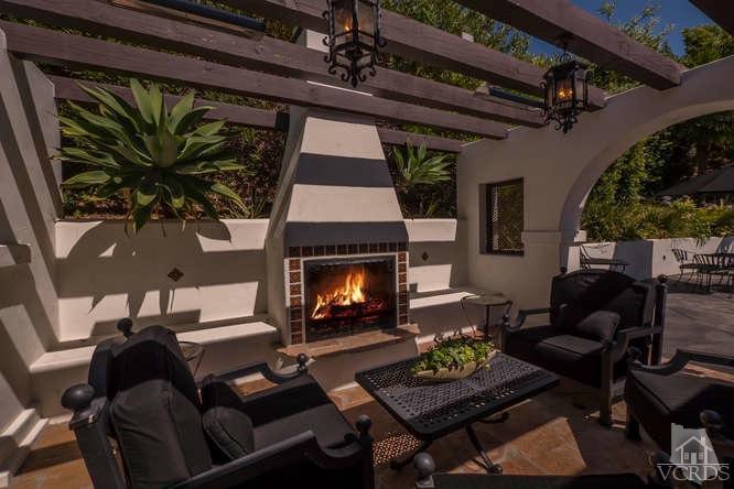 2016 Rayshire Street Thousand Oaks, CA 91362 - Photo 44 of 66 a living room with furniture and a fireplace