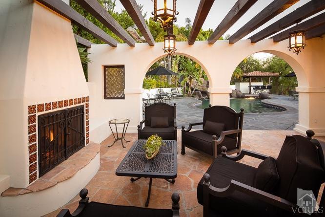 2016 Rayshire Street Thousand Oaks, CA 91362 - Photo 48 of 66 a living room with furniture and a fireplace