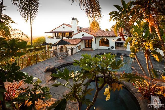 2016 Rayshire Street Thousand Oaks, CA 91362 - Photo 62 of 66 a front view of a house with a yard and balcony