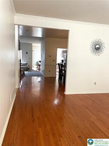 a view of a livingroom with wooden floor
