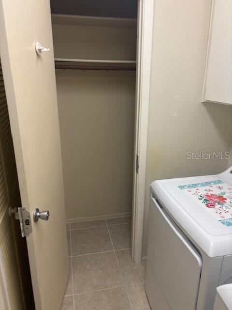 149 Club House Boulevard, Unit 149 New Smyrna Beach, FL 32168 - Photo 10 of 32 a utility room with dryer and washer