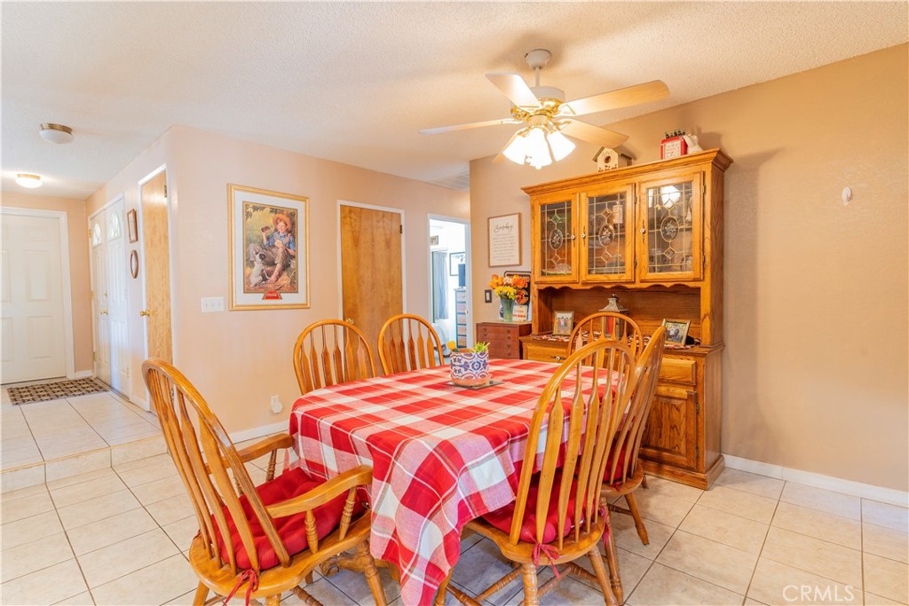 17516 Olive Street Hesperia, CA 92345 - Photo 13 of 32 a bedroom with a bed and wooden floor