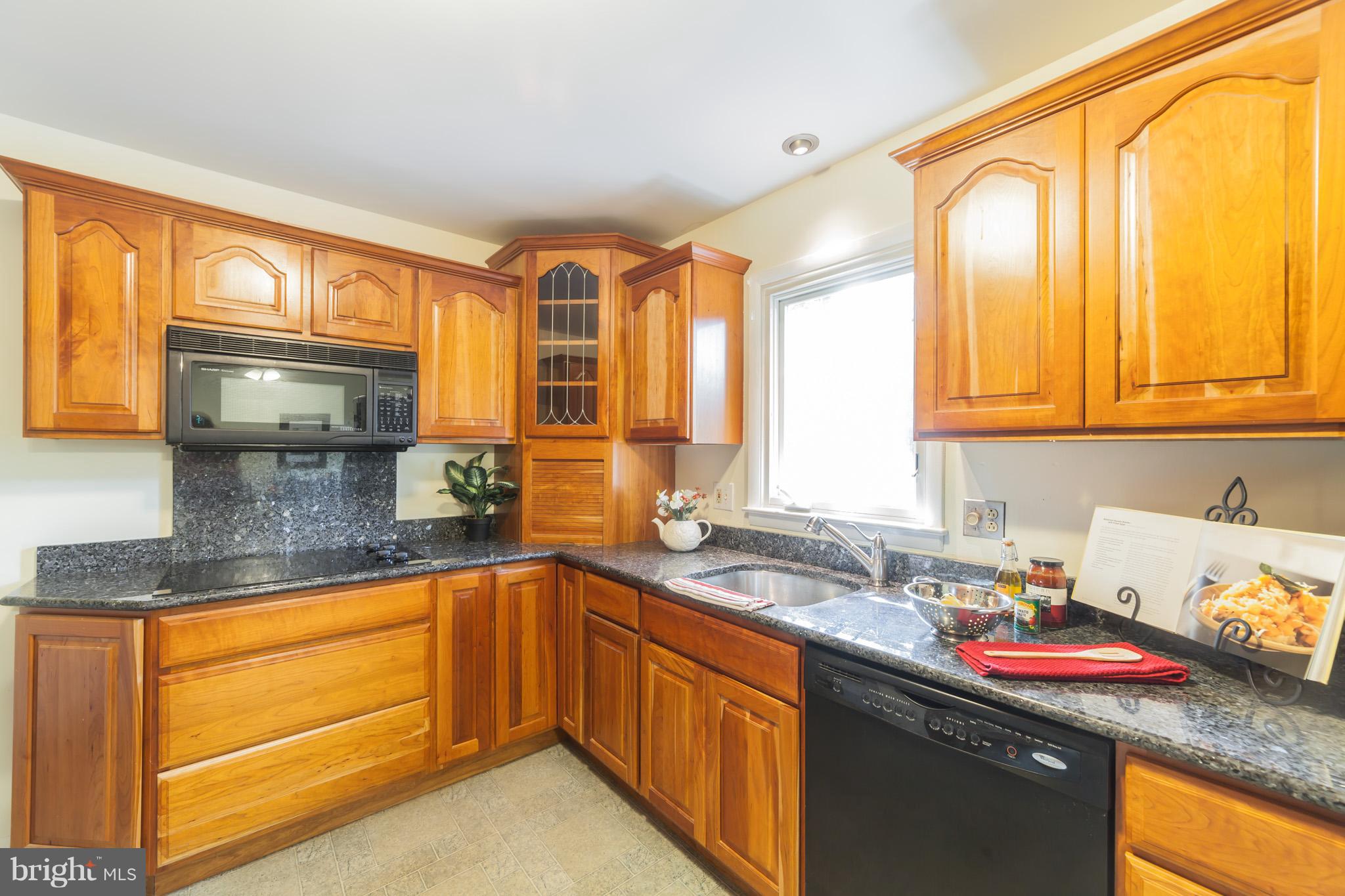 3804 Sweet Air Road Phoenix, MD 21131 - Photo 9 of 15 a kitchen with a sink and a window