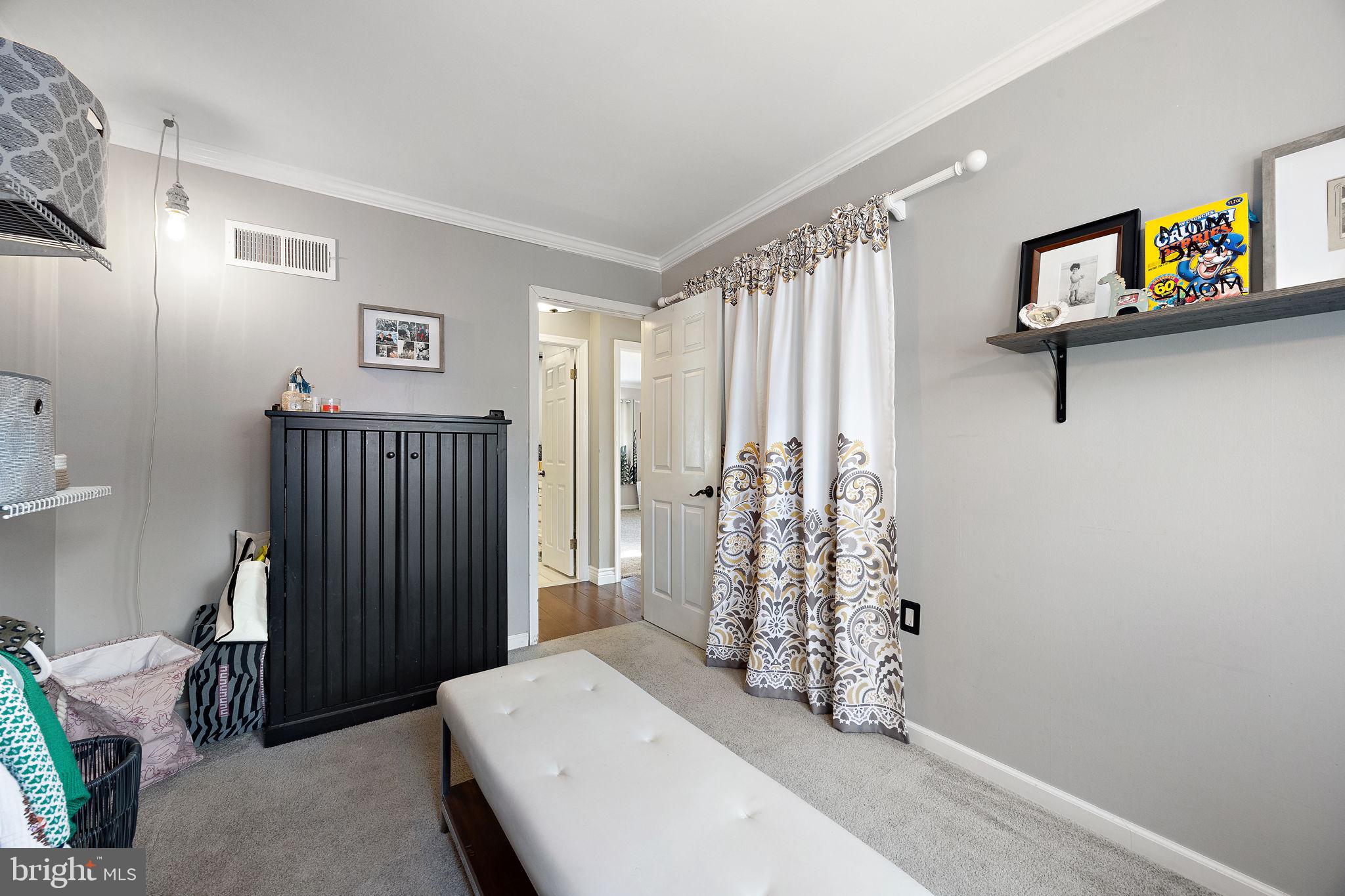 1400 Carson Road Wilmington, DE 19803 - Photo 21 of 44 a bedroom with a bed and a window