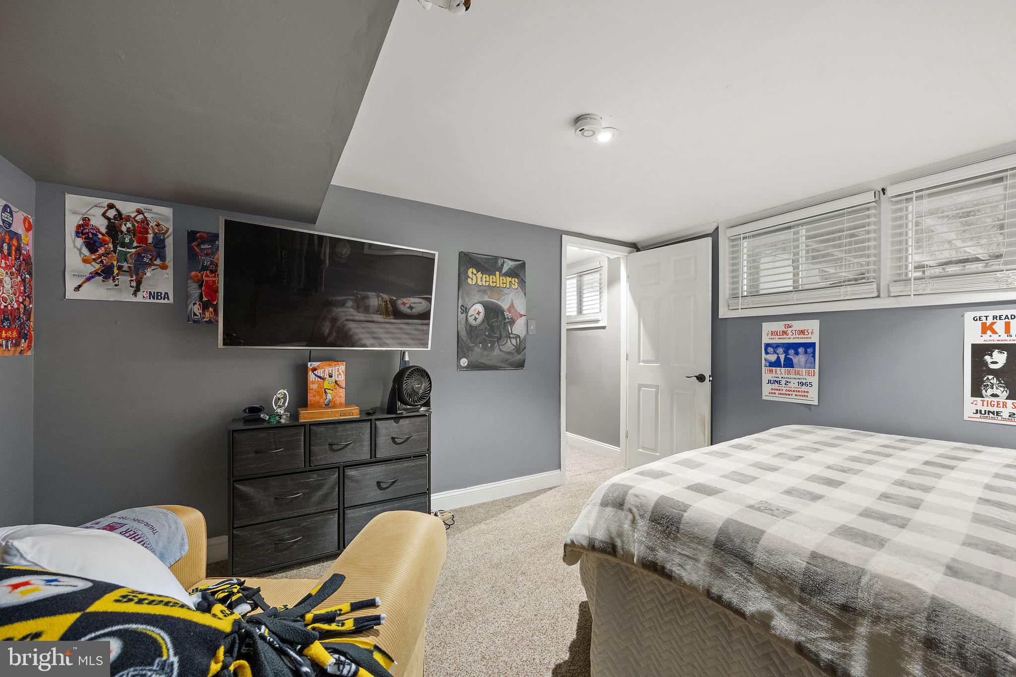 1400 Carson Road Wilmington, DE 19803 - Photo 37 of 44 a bedroom with a bed and dresser