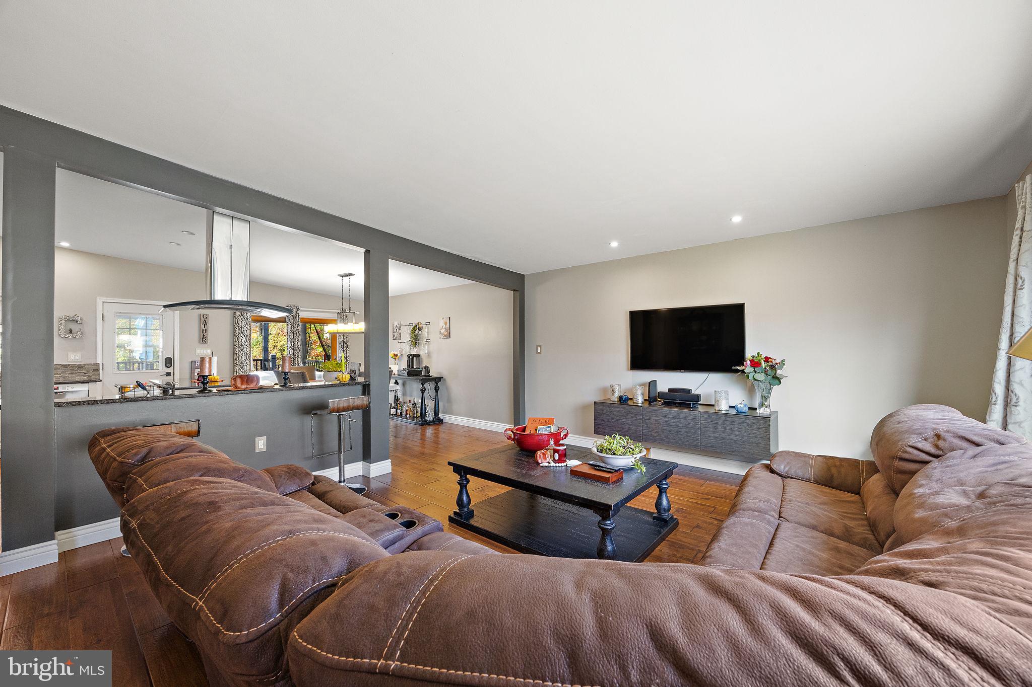 1400 Carson Road Wilmington, DE 19803 - Photo 6 of 44 a living room with furniture and a flat screen tv