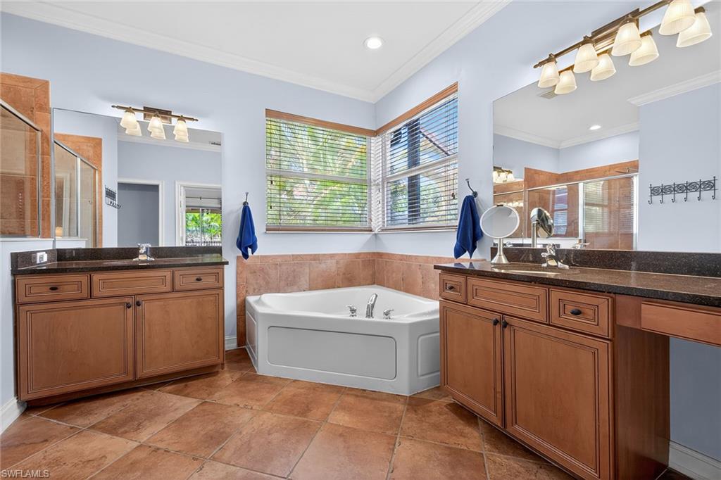 9960 Rookery Circle Estero, FL 33928 - Photo 25 of 49 Primary Suite Bathroom