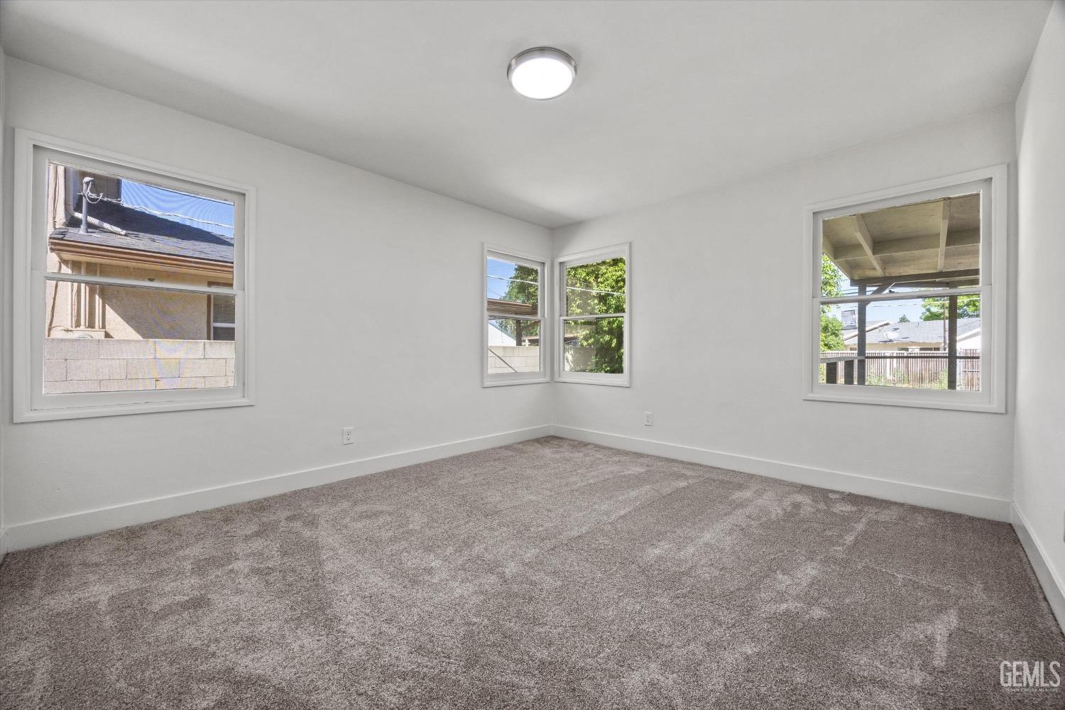 Undisclosed Address Bakersfield, CA 93301 - Photo 21 of 33 a view of an empty room with a window