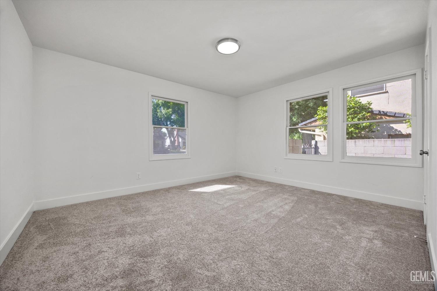 Undisclosed Address Bakersfield, CA 93301 - Photo 22 of 33 an empty room with windows