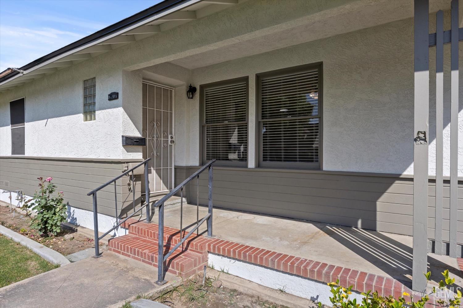 Undisclosed Address Bakersfield, CA 93301 - Photo 4 of 33 a front view of a house with seating space