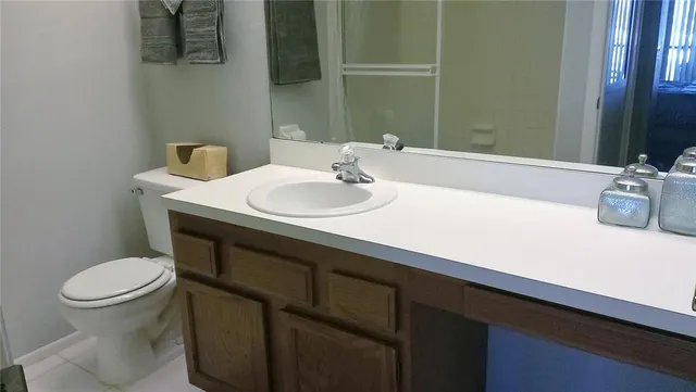 a bathroom with a sink and a toilet