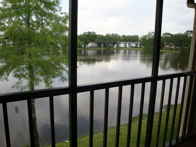 a view of a lake from a balcony