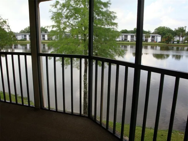 a view of a lake from a balcony