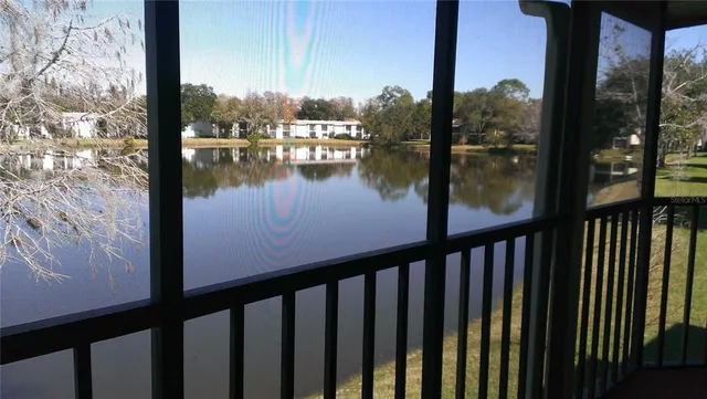 a view of a lake from a balcony