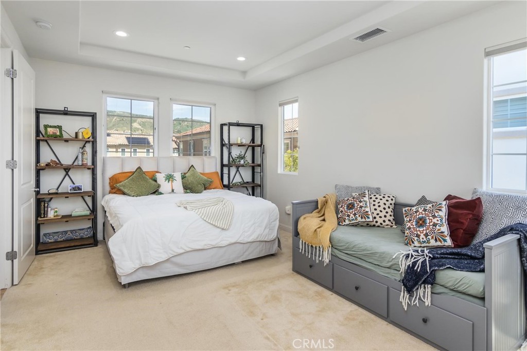 20724 Beech Circle Porter Ranch, CA 91326 - Photo 16 of 27 a bedroom with a bed and window