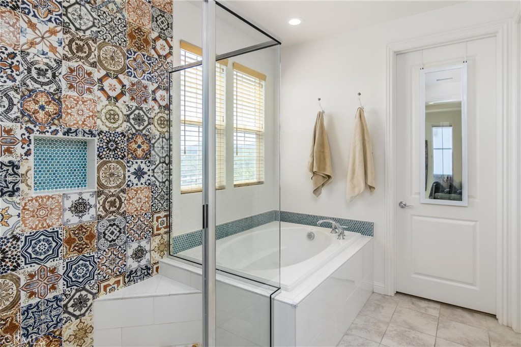 20724 Beech Circle Porter Ranch, CA 91326 - Photo 18 of 27 a bathroom with a bathtub and shower