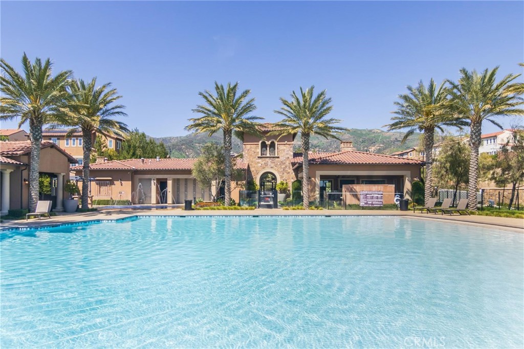 20724 Beech Circle Porter Ranch, CA 91326 - Photo 22 of 27 a view of a swimming pool and a chair
