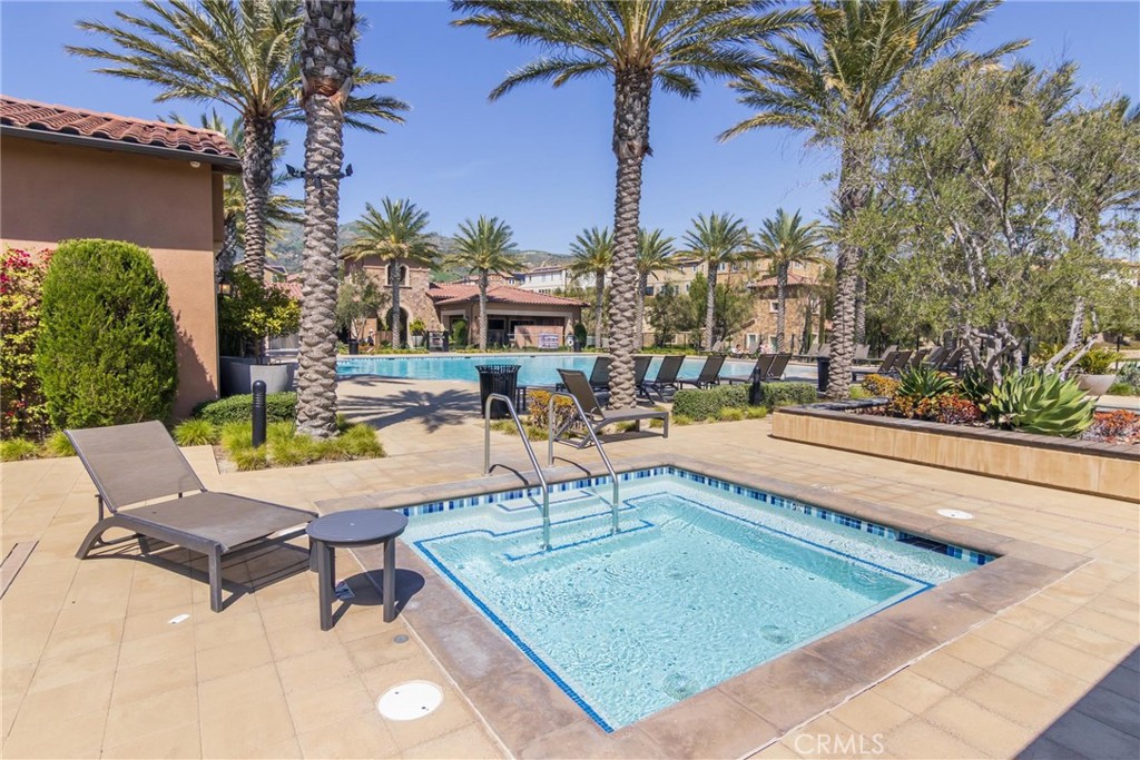 20724 Beech Circle Porter Ranch, CA 91326 - Photo 24 of 27 a swimming pool with outdoor seating and yard