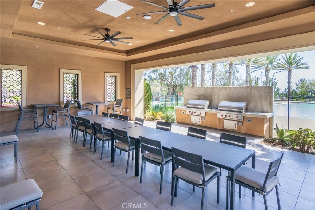 20724 Beech Circle Porter Ranch, CA 91326 - Photo 25 of 27 a view of a dining room with furniture window and outside view