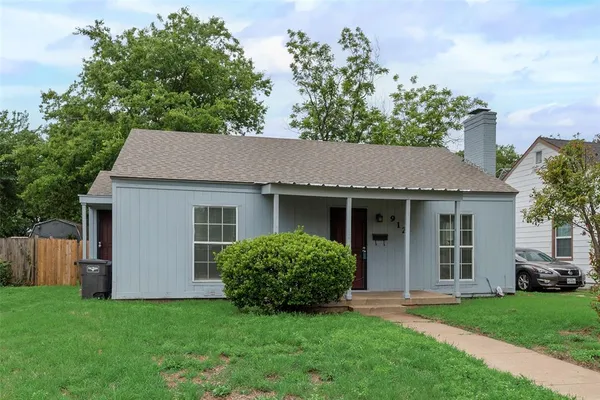 a view of a house with a garden