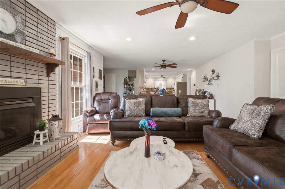 107 Oxford Road Hopewell, VA 23860 - Photo 32 of 50 Hardwood flooring, brick-faced fireplace with hear