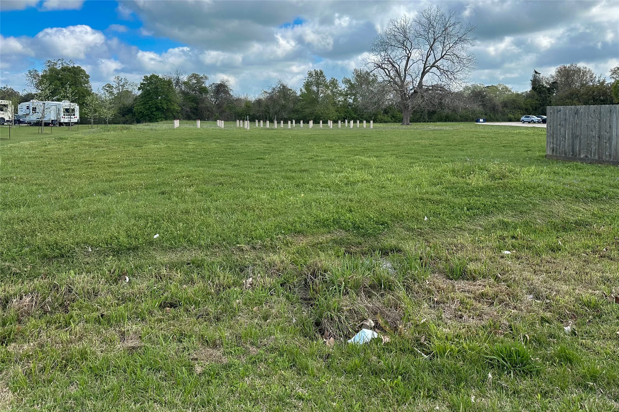 1211 Old Main Street Sweeny, TX 77480 - Photo 3 of 6 a view of a field of grass and trees