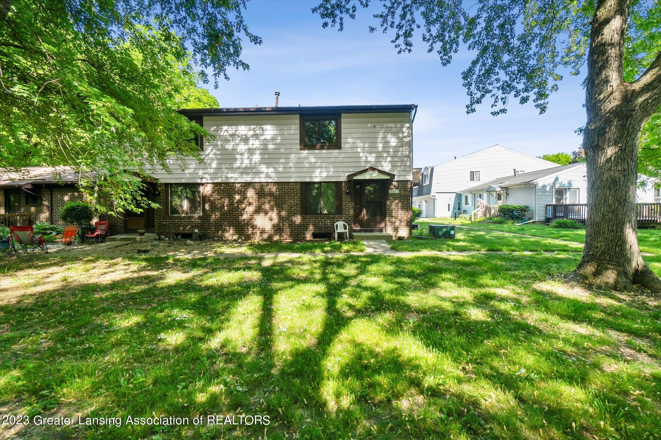 3940 Hunters Ridge Drive, Unit 3 Lansing, MI 48911 - Photo 3 of 35 03-3940-Hunters-Ridge-Dr-Unit-3-Lansing-